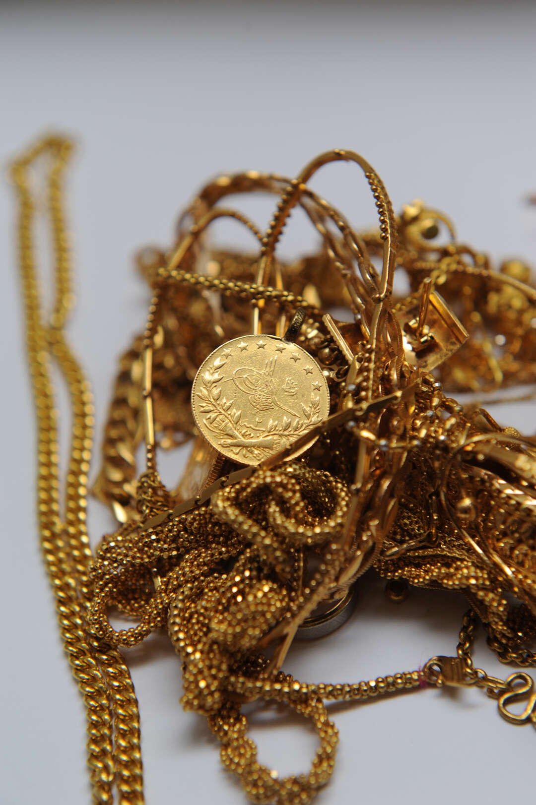 Gold price tops $2,400 again on signs of cooling inflation