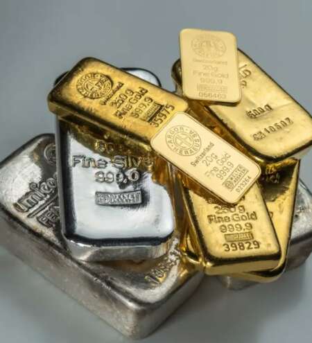 Gold price near steady, silver down on profit taking